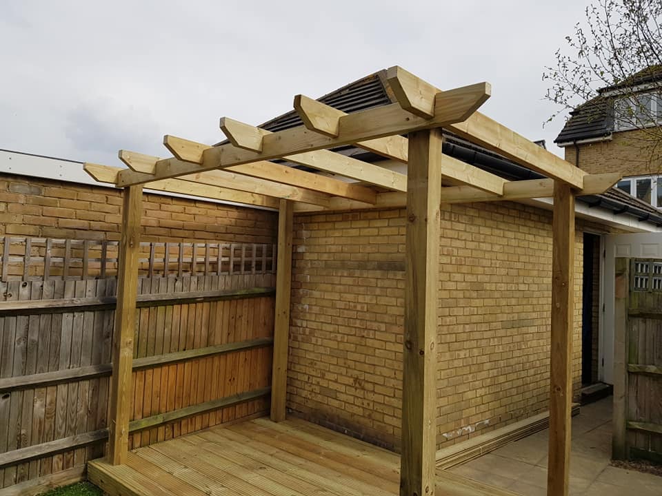 Timber pergola built on decking base